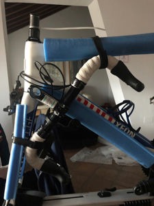 The handlebar attached to the bike for transport